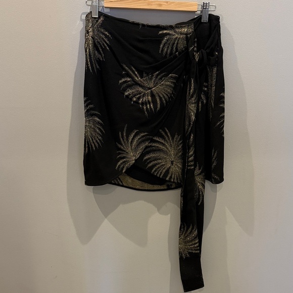 Victoria Beckham Dresses & Skirts - Victoria Beckham Black Mini skirt with tie and gold palms detail.
